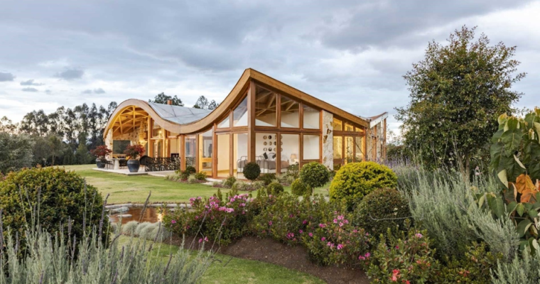 Modern Wooden House with Wavy Roof